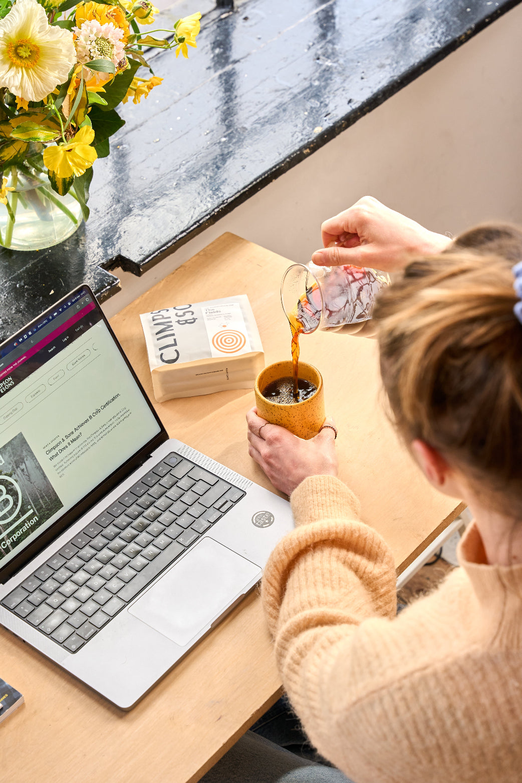 Pouring coffee into mug