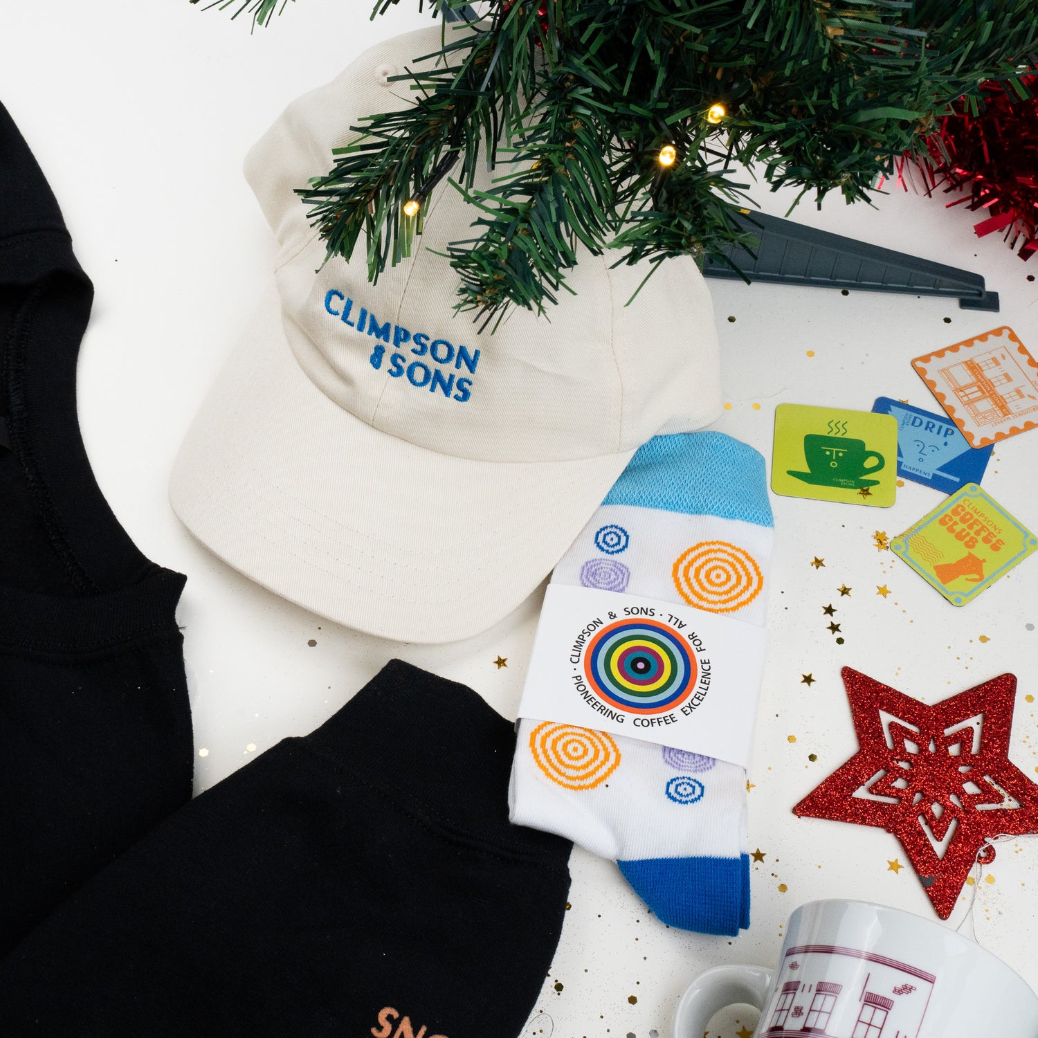 Baseball cap, magnets and socks merch